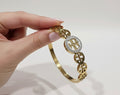 Gold Clover Bangle Bracelet with Crystal Circle Accent